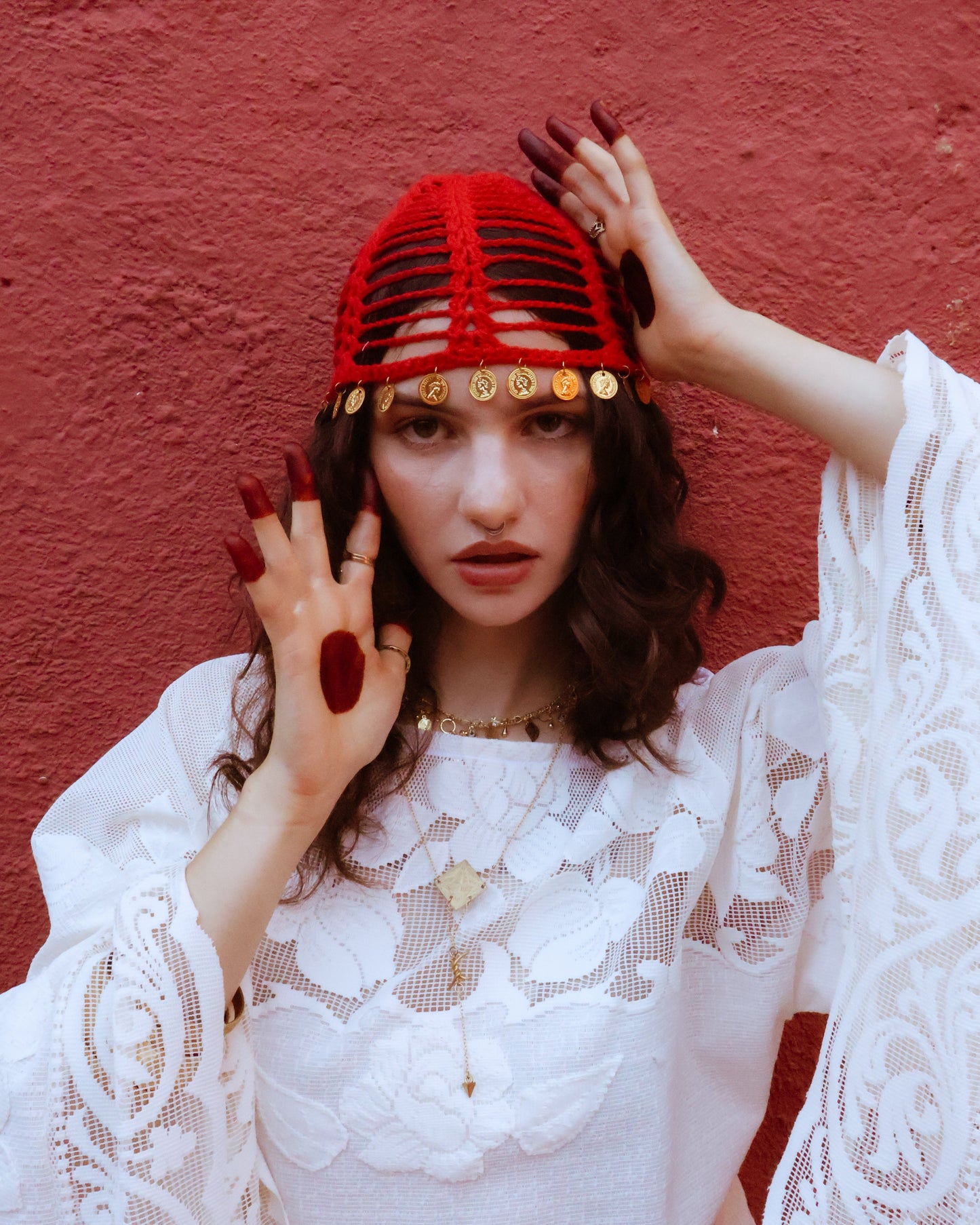 Red coin hat